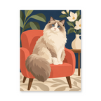A fluffy cream-and-brown cat seated on a coral armchair beside white flowers - animal paint by numbers artwork