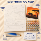 Elephant Sunset paint by numbers kit showing numbered canvas, paint pots, three detail brushes, color reference and guide