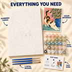 Stretching Calico paint by numbers kit showing numbered canvas, paint pots, three detail brushes, color reference and guide