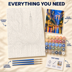 Manhattan Rain paint by numbers kit showing numbered canvas, paint pots, three brushes, color reference and guide