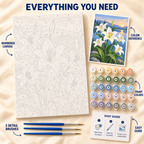 Lakeside Lilies paint by numbers kit showing numbered canvas, paint pots, three brushes, reference and guide