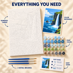 Coastal Waterfall paint by numbers kit showing numbered canvas, paint pots, three brushes, color reference and painting guide
