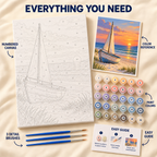 Beached Sailboat paint by numbers kit showing numbered canvas, paint pots, three brushes, color reference and painting guide